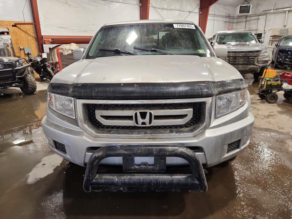 Photo 5 from auction – 2011 HONDA RIDGELINE with VIN 5FPYK1F43BB451321