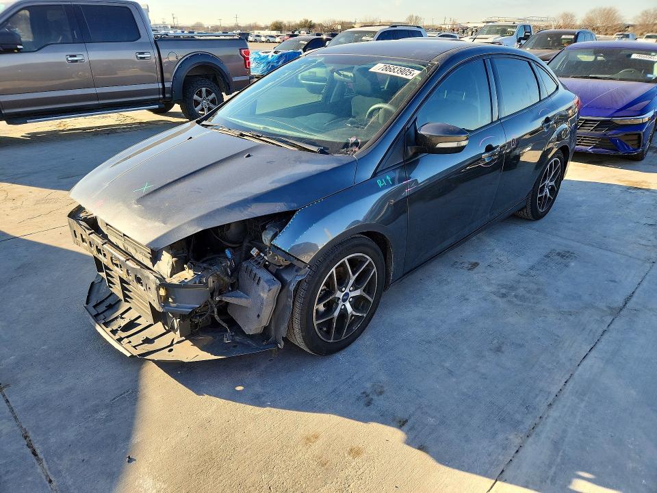 FORD FOCUS 2016 with VIN 1FADP3FE5GL406808 - Photo from auction