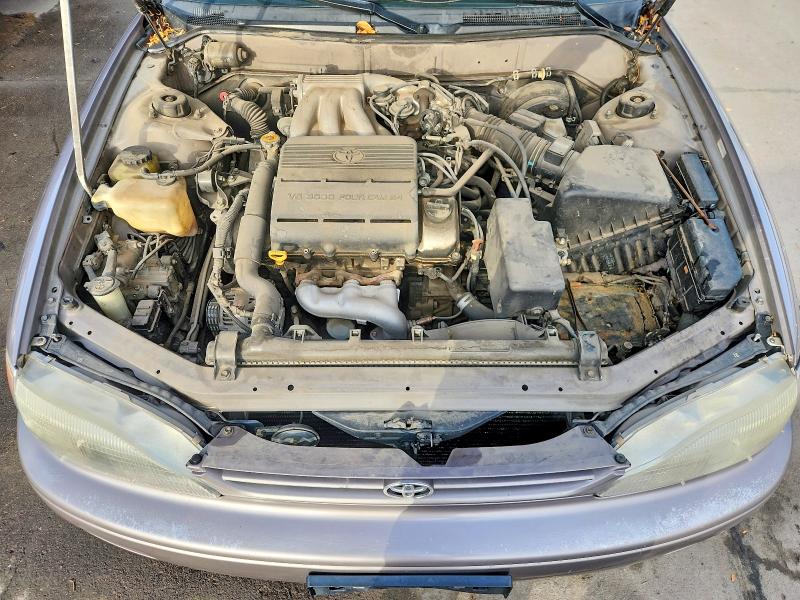 Photo 11 from auction – 1995 TOYOTA CAMRY XLE with VIN JT2GK13EXS0077945