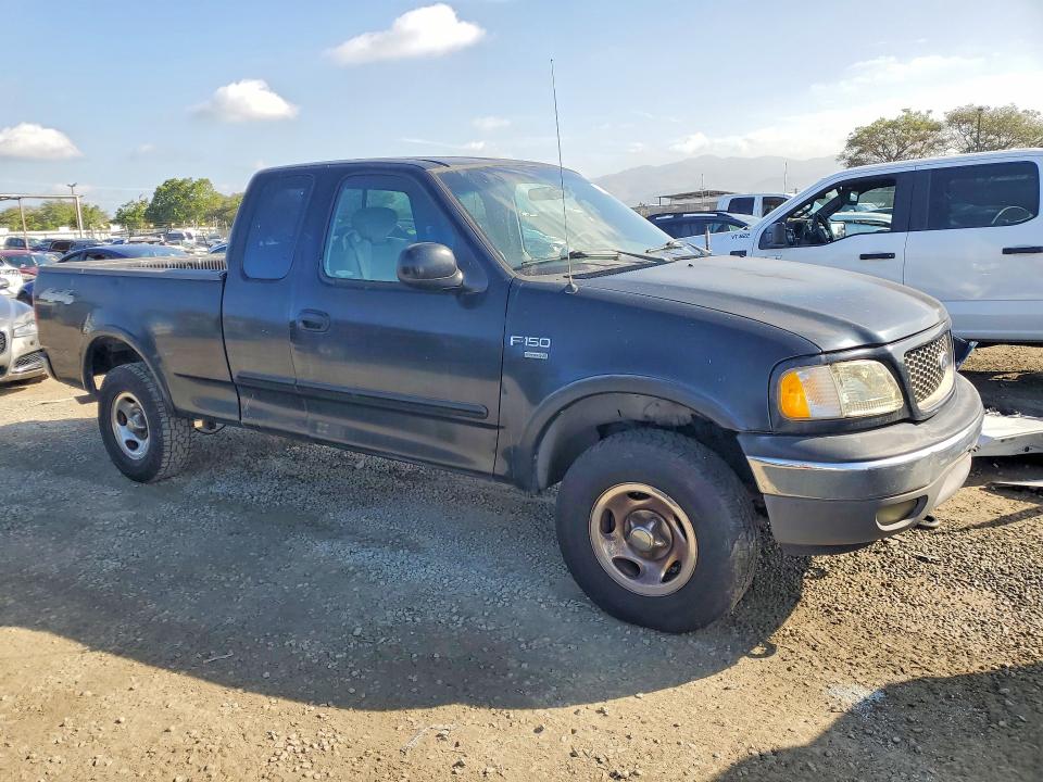 Photo 4 from auction – 2002 FORD F150 with VIN 1FTRX18L82NB21677