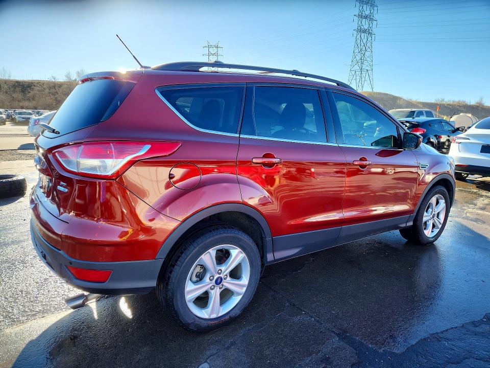 Photo 3 from auction – 2014 FORD ESCAPE SE with VIN 1FMCU9G99EUE12620