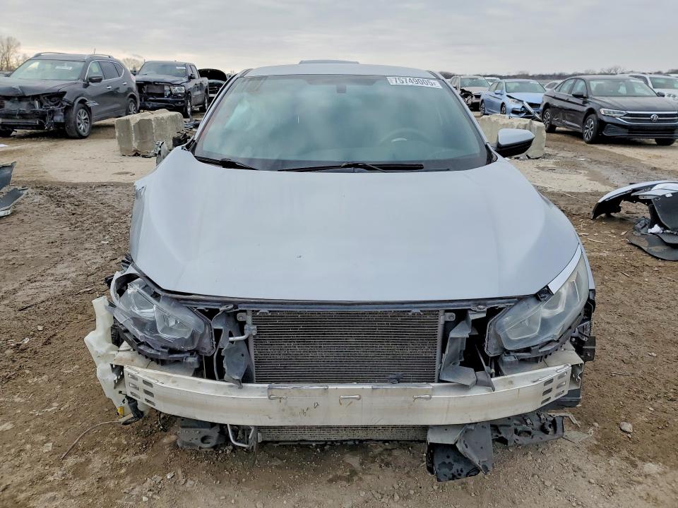 Photo 5 from auction – 2017 HONDA CIVC with VIN 2HGFC4B53HH305485