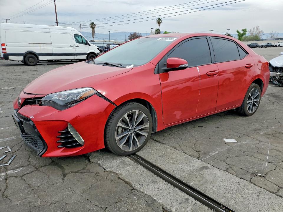 TOYOTA COROLLA 2017 with VIN 5YFBURHE9HP669550 - Photo from auction