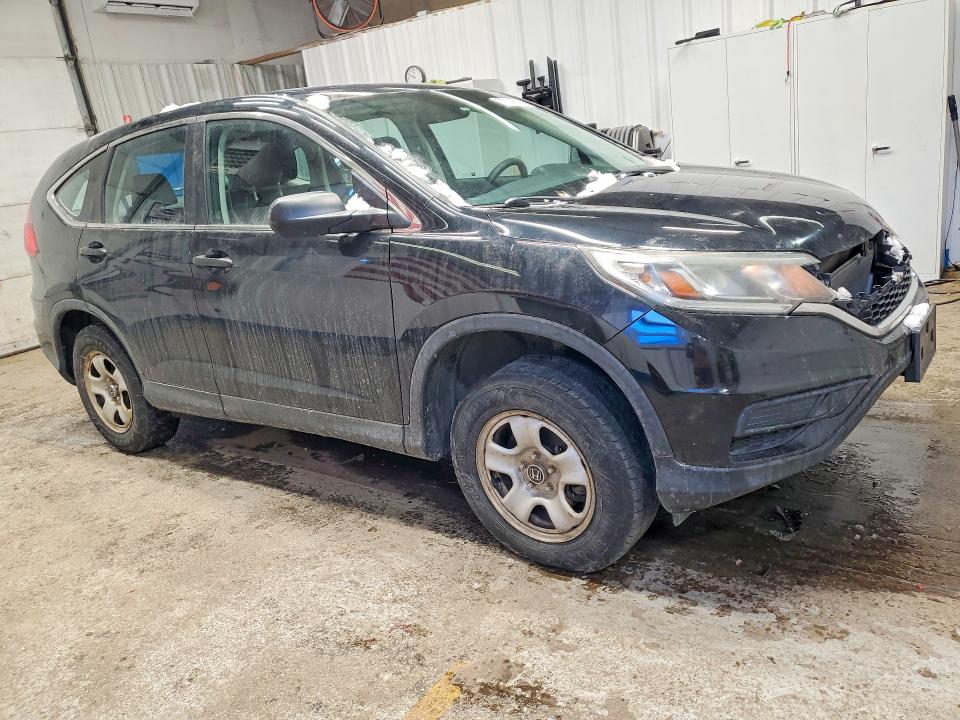 Photo 4 from auction – 2016 HONDA CR-V LX with VIN 5J6RM4H33GL141083