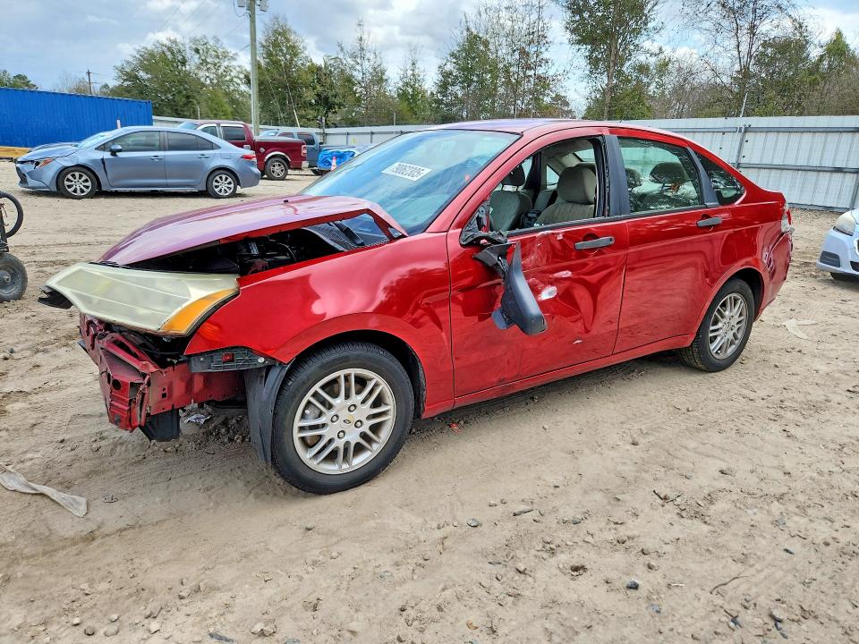 FORD FOCUS 2010 with VIN 1FAHP3FNXAW122386 - Photo from auction