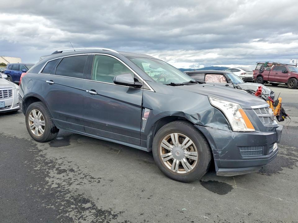 Photo 4 from auction – 2011 CADILLAC SRX LUXURY with VIN 3GYFNAEY8BS571550