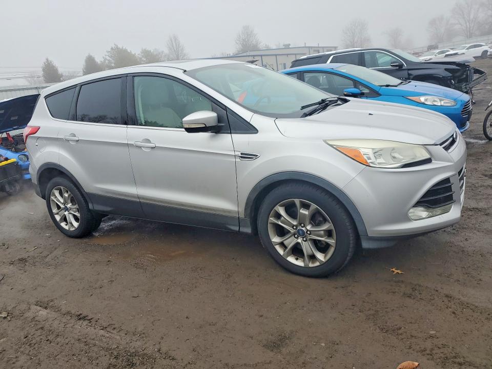 Photo 4 from auction – 2013 FORD ESCAPE with VIN 1FMCU0H96DUA41442