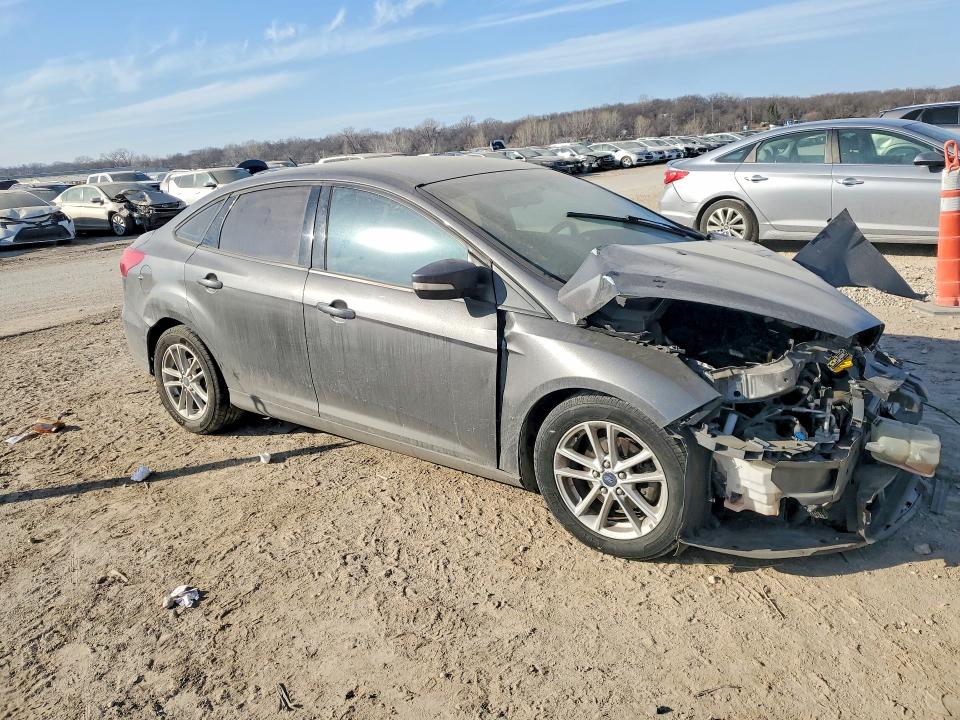Photo 4 from auction – 2015 FORD FOCUS with VIN 1FADP3F21FL379708