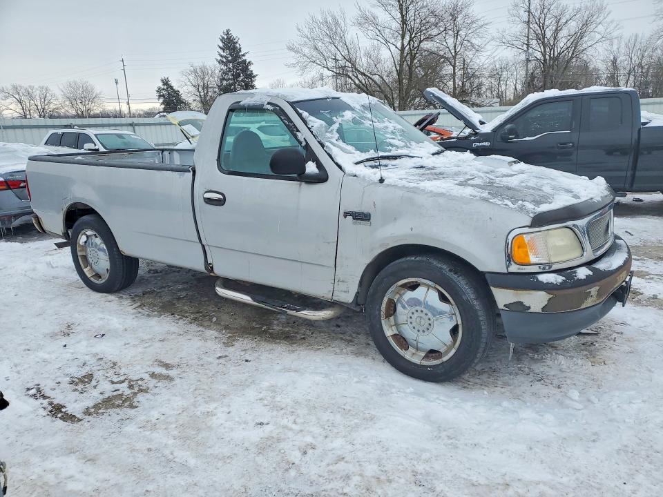 Photo 4 from auction – 2000 FORD F150 with VIN 1FTZF1729YNA21091