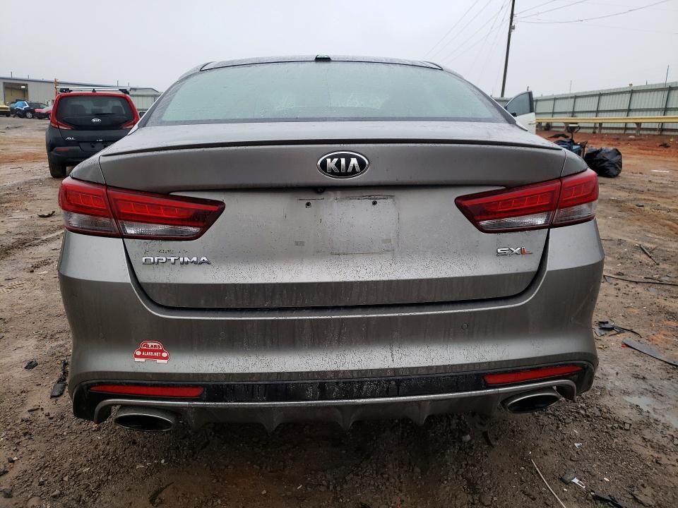 Photo 6 from auction – 2016 KIA OPTIMA with VIN 5XXGV4L25GG120129