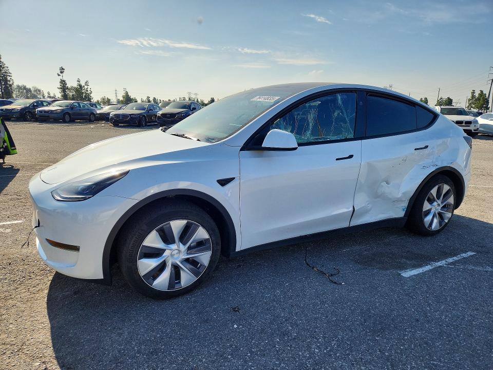 TESLA MODEL Y 2023 with VIN 7SAYGDED5PF946319 - Photo from auction