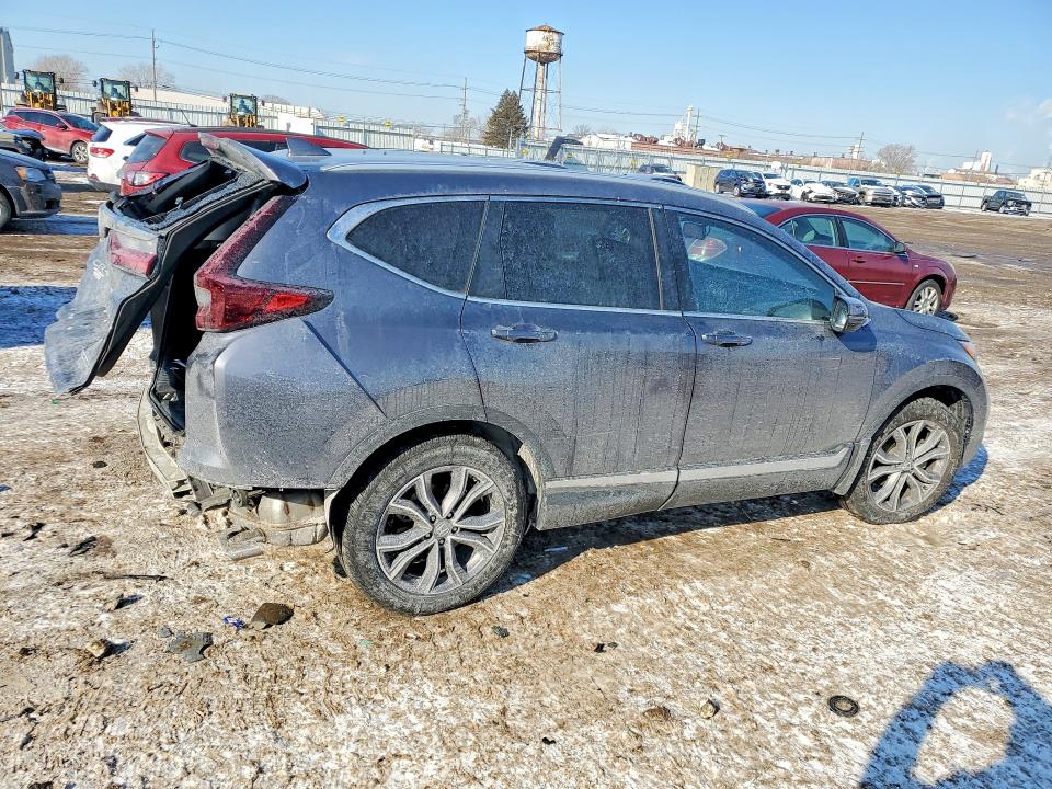 Photo 3 from auction – 2021 HONDA CR-V TOURI with VIN 5J6RW2H92ML019586