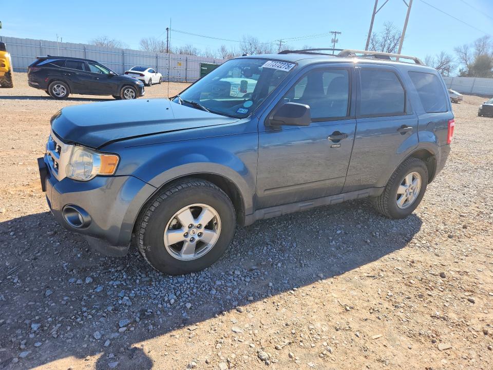 FORD ESCAPE 2011 with VIN 1FMCU0DG4BKB95998 - Photo from auction