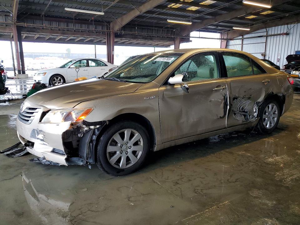 TOYOTA CAMRY HYBR 2007 with VIN JTNBB46K773022679 - Photo from auction