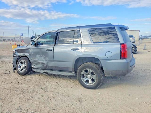 Photo 2 from auction – 2020 CHEVROLET TAHOE with VIN 1GNSCAKC7LR179531