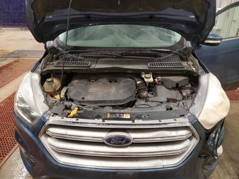 Photo 12 from auction – 2018 FORD ESCAPE with VIN 1FMCU9J96JUB89410