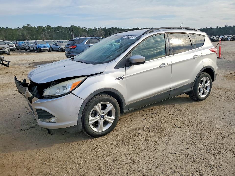 FORD ESCAPE 2014 with VIN 1FMCU0GX9EUD36763 - Photo from auction
