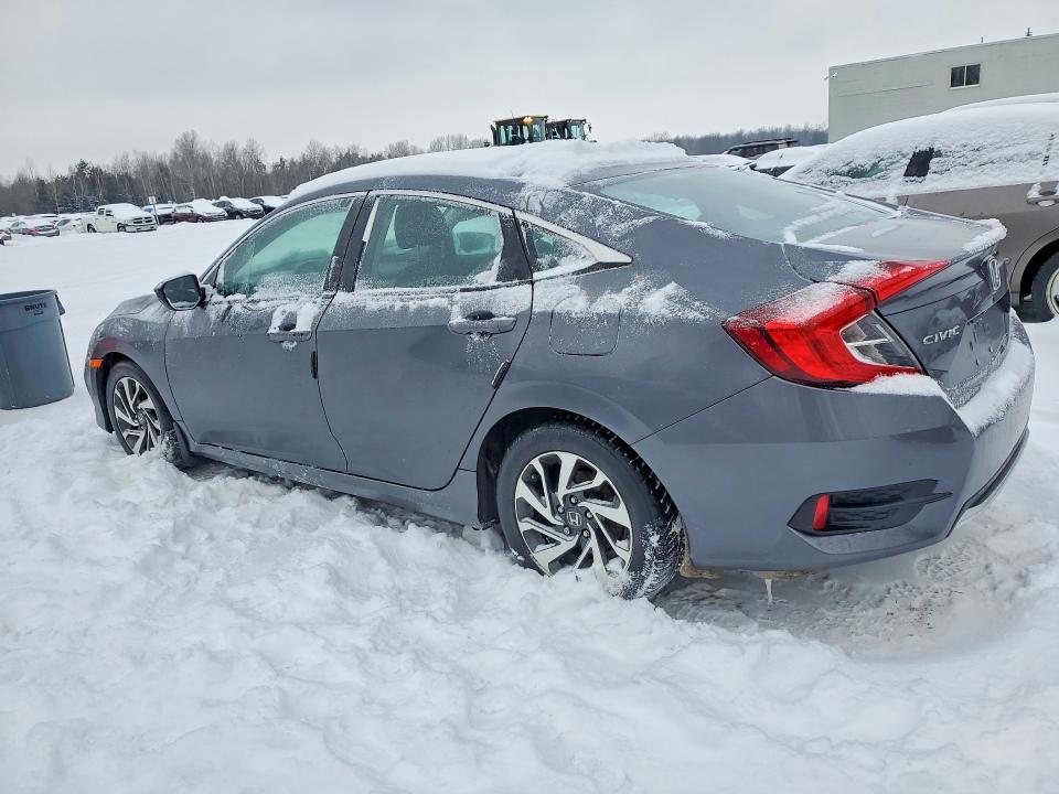 Photo 2 from auction – 2019 HONDA CIVIC EX with VIN 2HGFC2F72KH015259