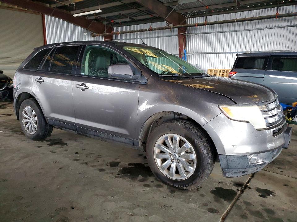 Photo 4 from auction – 2010 FORD EDGE with VIN 2FMDK3JC7ABA22000