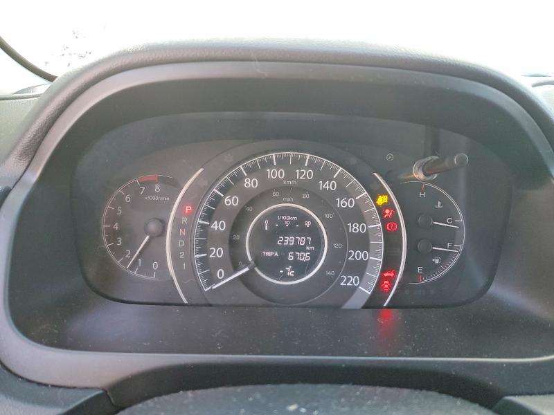 Photo 9 from auction – 2014 HONDA CR-V with VIN 2HKRM4H90EH128027