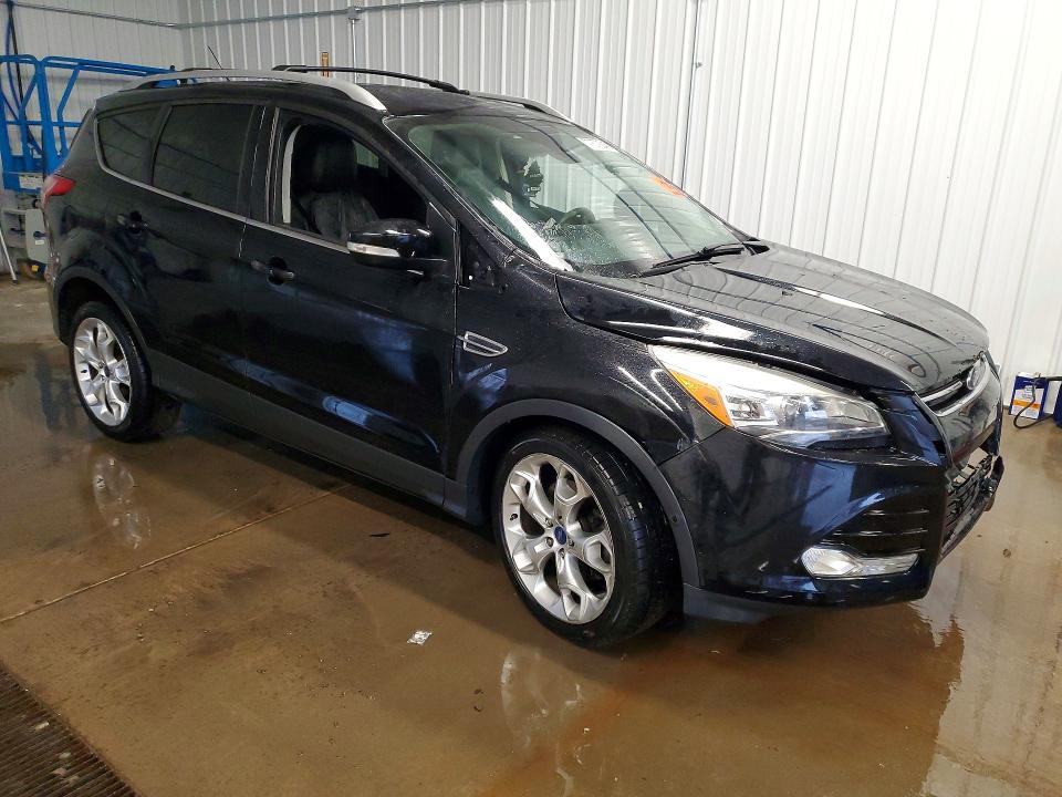 Photo 4 from auction – 2016 FORD ESCAPE with VIN 1FMCU0J96GUB79450