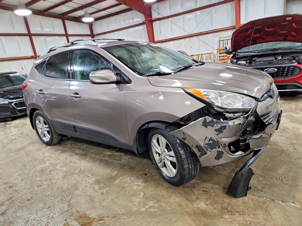 Photo 4 from auction – 2012 HYUNDAI TUCSON GLS with VIN KM8JUCAC0CU351406