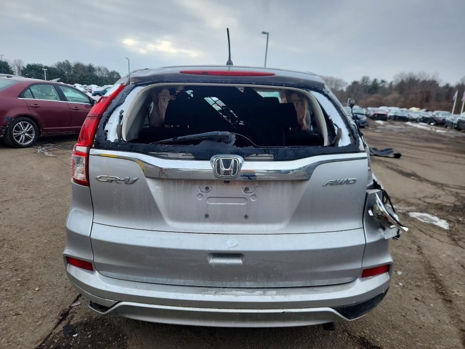 Photo 6 from auction – 2016 HONDA CR-V with VIN 2HKRM4H58GH624449