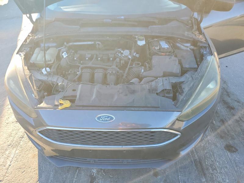 Photo 11 from auction – 2018 FORD FOCUS S with VIN 1FADP3E21JL209844