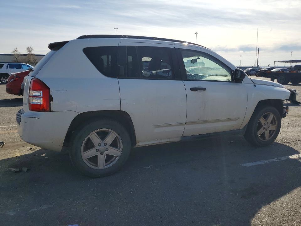 Photo 3 from auction – 2009 JEEP COMPASS SP with VIN 1J4FF47B29D205861