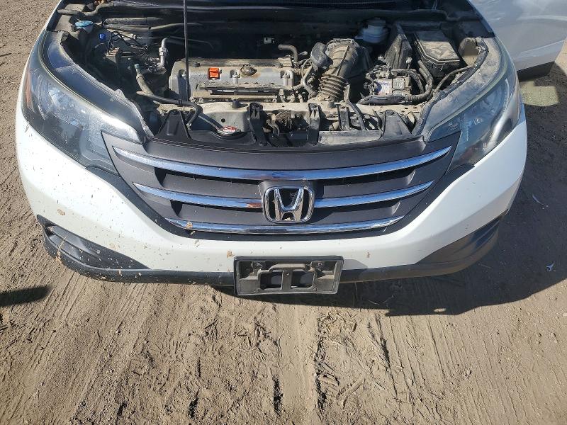 Photo 11 from auction – 2014 HONDA CR-V LX with VIN 5J6RM3H30EL023693