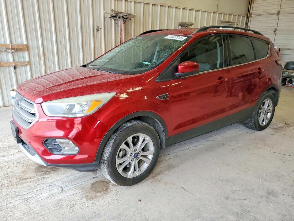 FORD ESCAPE 2018 with VIN 1FMCU0GD7JUA63676 - Photo from auction