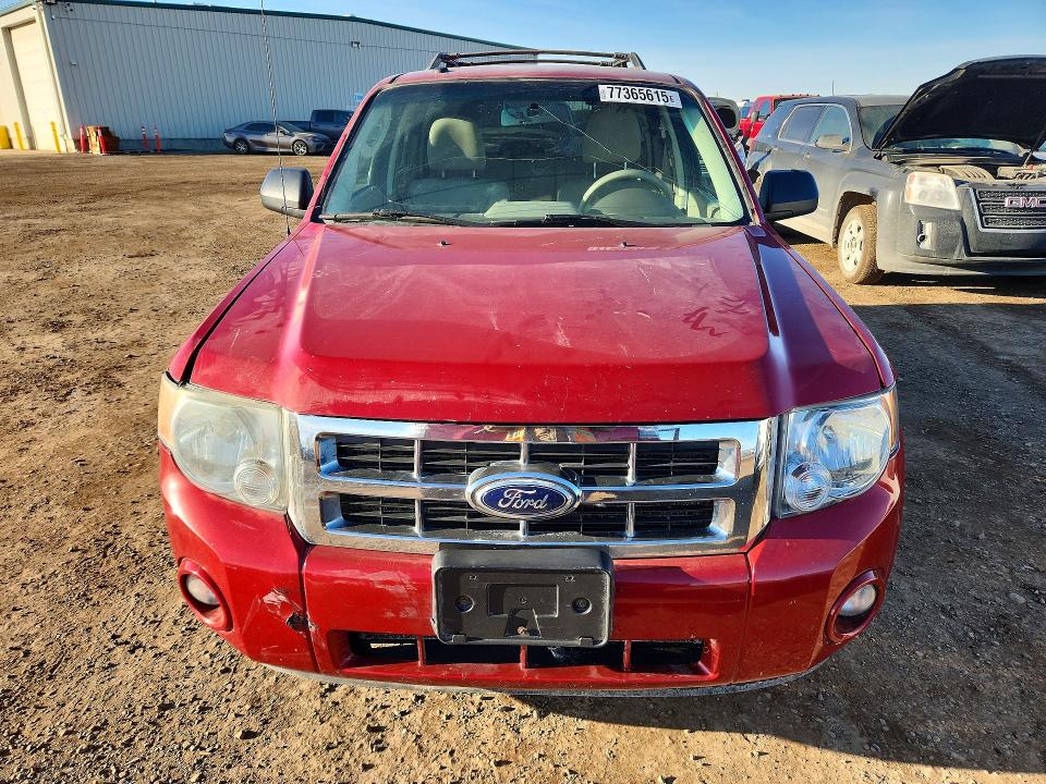 Photo 5 from auction – 2010 FORD ESCAPE with VIN 1FMCU0D77AKC92711