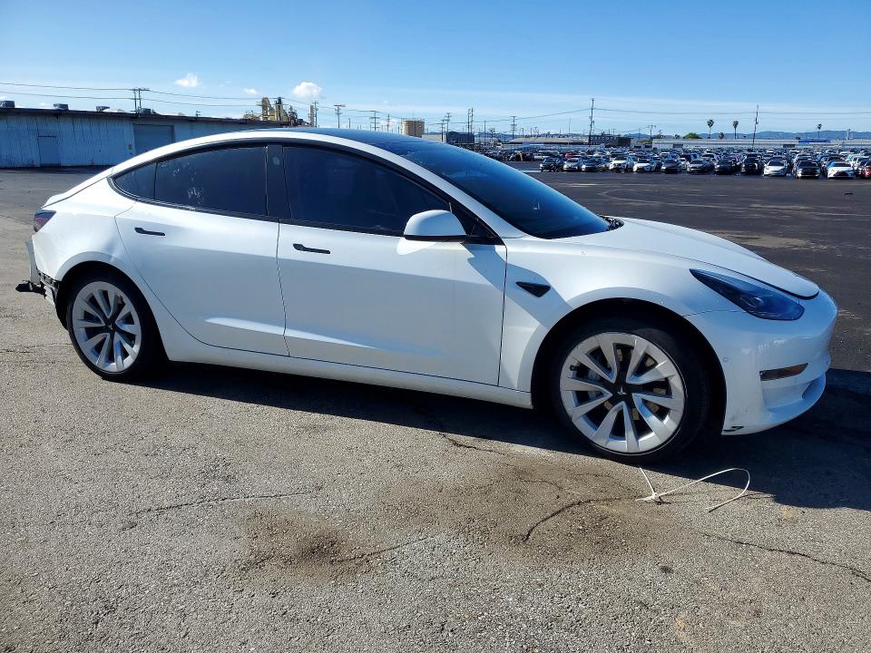 Photo 4 from auction – 2022 TESLA MODEL 3 with VIN 5YJ3E1EB1NF130859