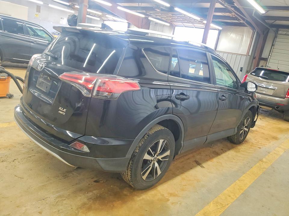 Photo 3 from auction – 2016 TOYOTA RAV4 XLE with VIN 2T3RFREV5GW538827