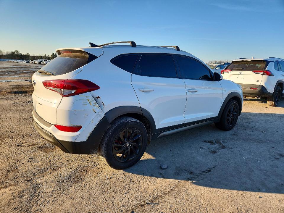 Photo 3 from auction – 2016 HYUNDAI TUCSON with VIN KM8J33A43GU242195