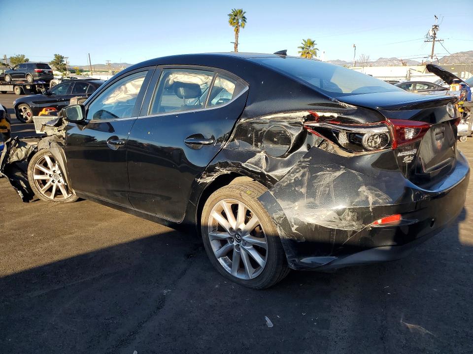 Photo 2 from auction – 2017 MAZDA 3 with VIN JM1BN1W31H1129646