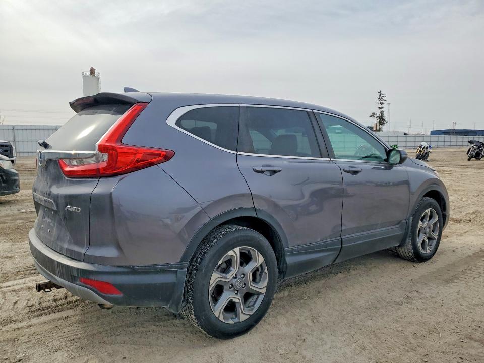 Photo 3 from auction – 2017 HONDA CR-V EXL with VIN 5J6RW2H80HL061736