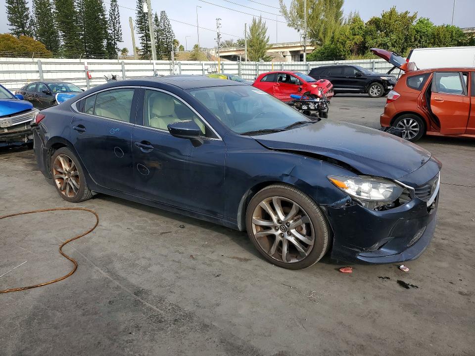 Photo 4 from auction – 2015 MAZDA 6 with VIN JM1GJ1W67F1176057