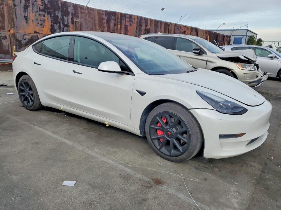Photo 4 from auction – 2021 TESLA MODEL 3 with VIN 5YJ3E1EA7MF006424