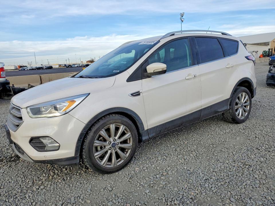 FORD ESCAPE 2017 with VIN 1FMCU9J9XHUC01357 - Photo from auction