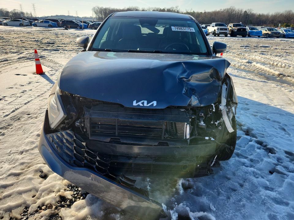 Photo 5 from auction – 2023 KIA SPORTAGE E with VIN 5XYK33AF6PG064083