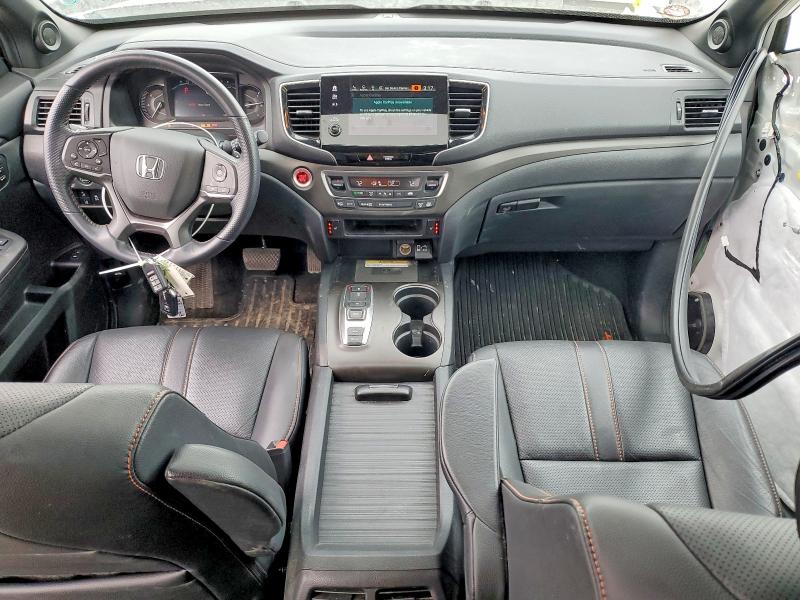 Photo 8 from auction – 2023 HONDA PASSPORT T with VIN 5FNYF8H64PB044281