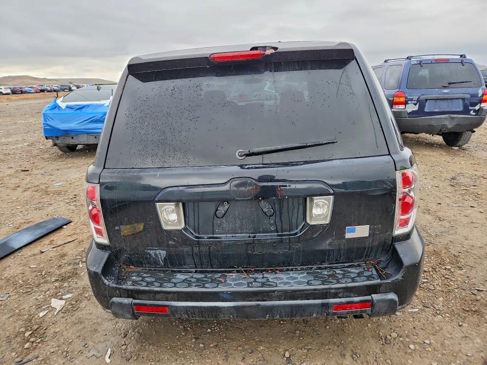 Photo 6 from auction – 2006 HONDA PILOT LX with VIN 2HKYF18186H547548