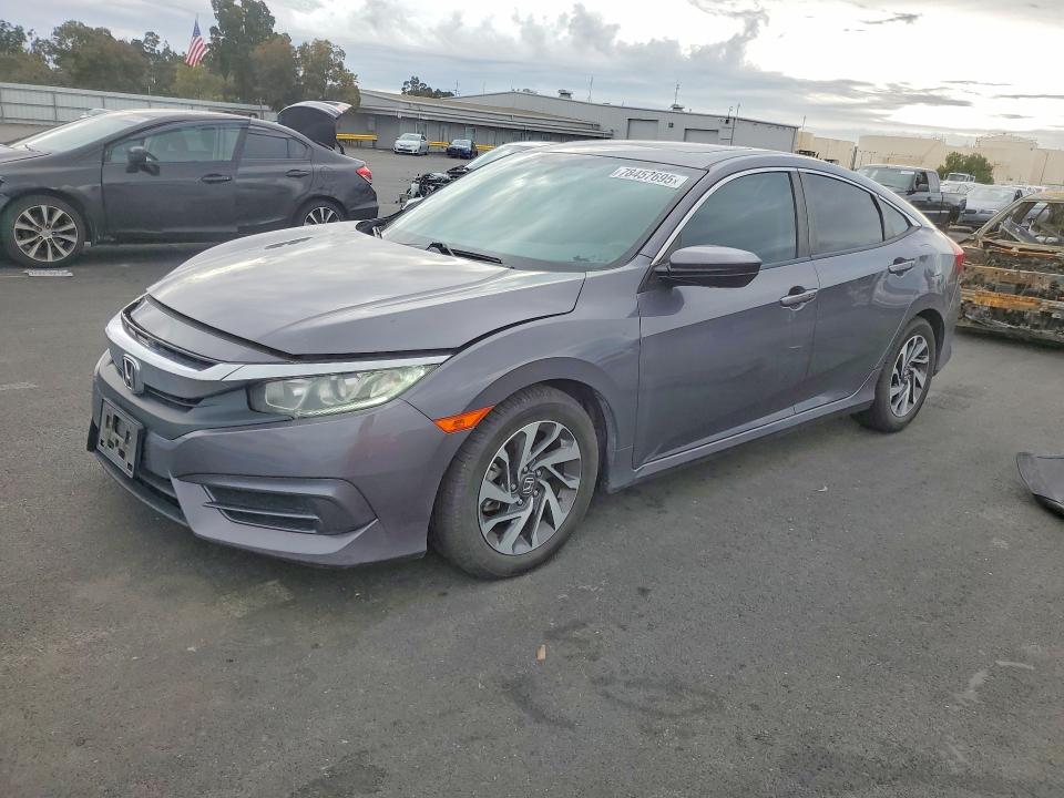 HONDA CIVIC 2016 with VIN 19XFC2F75GE231849 - Photo from auction