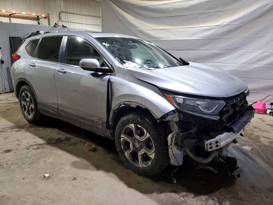 Photo 4 from auction – 2018 HONDA CR-V EX with VIN 7FARW2H50JE084667