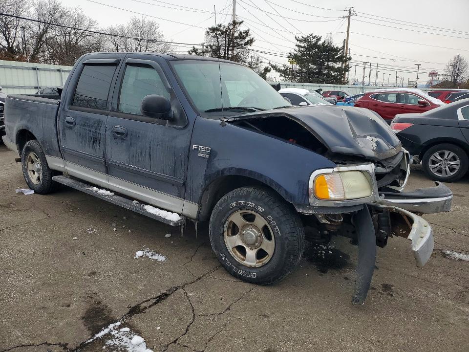 Photo 4 from auction – 2003 FORD F150 with VIN 1FTRW07693KD57072