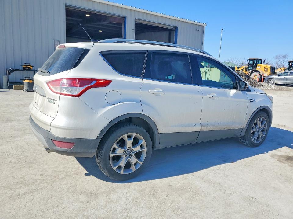 Photo 3 from auction – 2014 FORD ESCAPE with VIN 1FMCU0JX0EUE39837