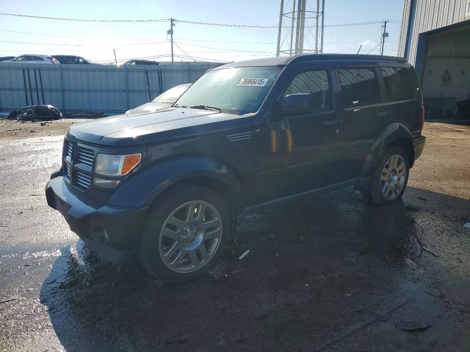 DODGE NITRO 2011 with VIN 1D4PT4GK5BW576111 - Photo from auction