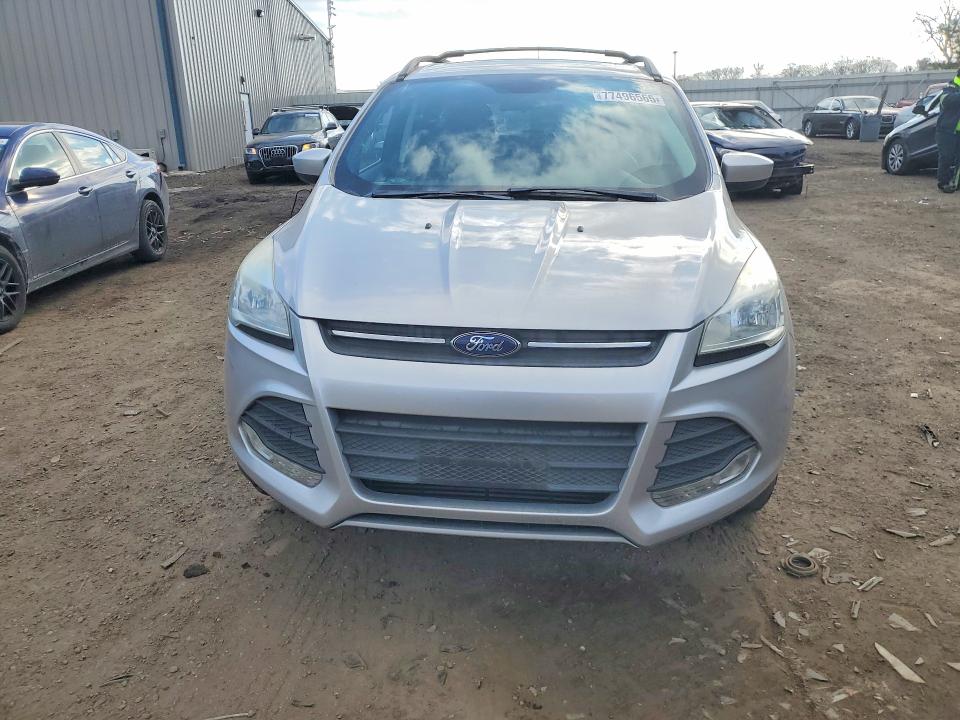Photo 5 from auction – 2016 FORD ESCAPE SE with VIN 1FMCU9G98GUC52250
