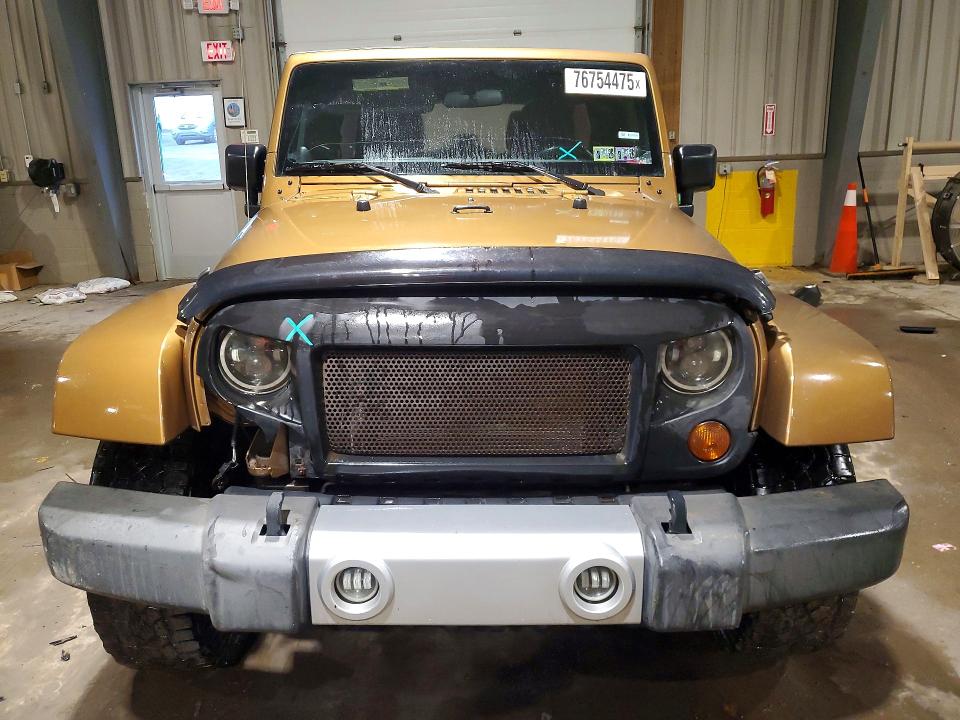 Photo 5 from auction – 2011 JEEP WRANGLER U with VIN 1J4BA7H1XBL591042